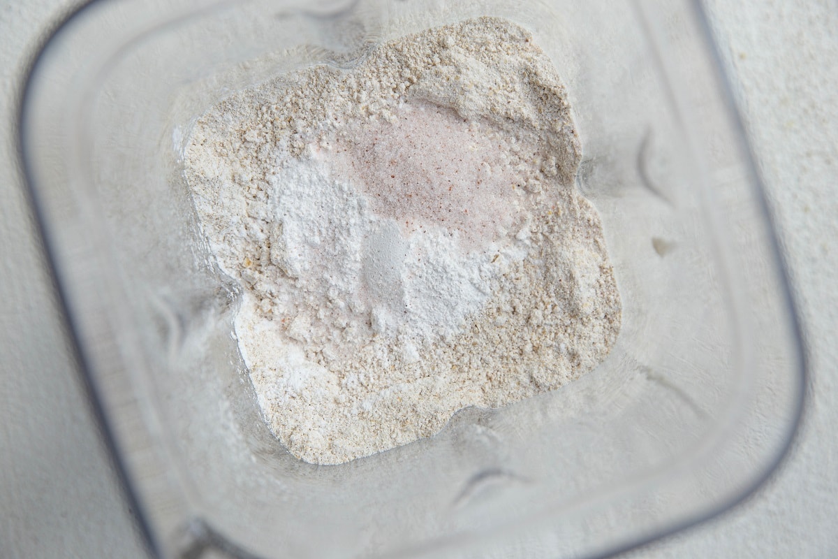 Dry ingredients for muffins in a blender.