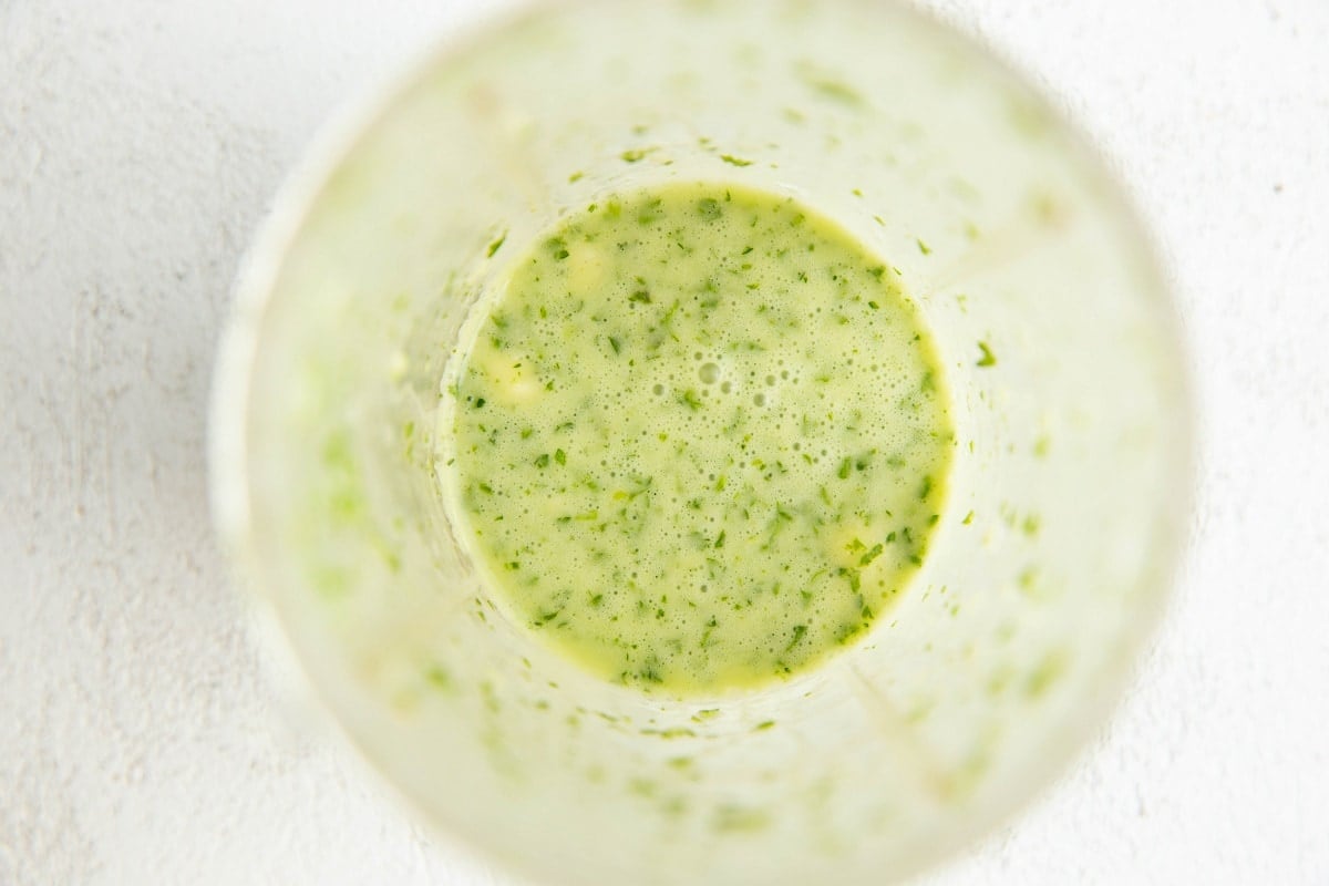 Cilantro lime dressing in a small blender.