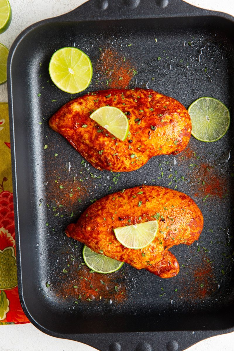 Chili Lime chicken breasts in a baking dish, fresh out of the oven.