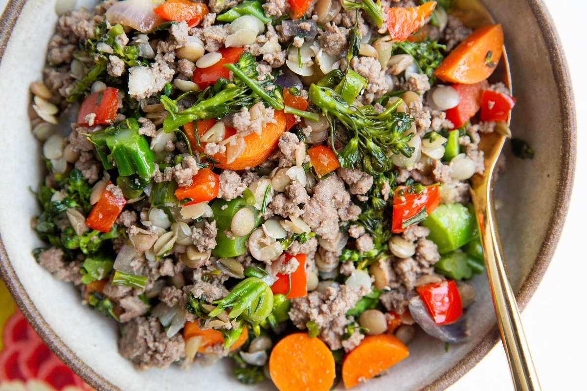 Bowl of ground beef, vegetables, and lentils.