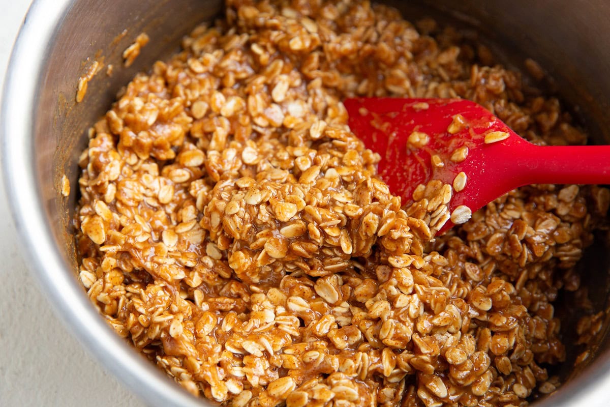 No-Bake Almond Butter Oatmeal Cookie dough in a saucepan.