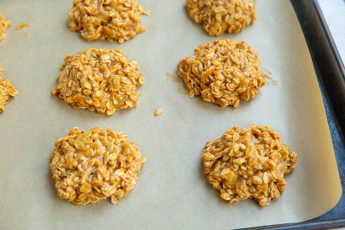 No-bake cookie dough on a parchment-lined baking sheet, ready to go into the refrigerator or freezer.