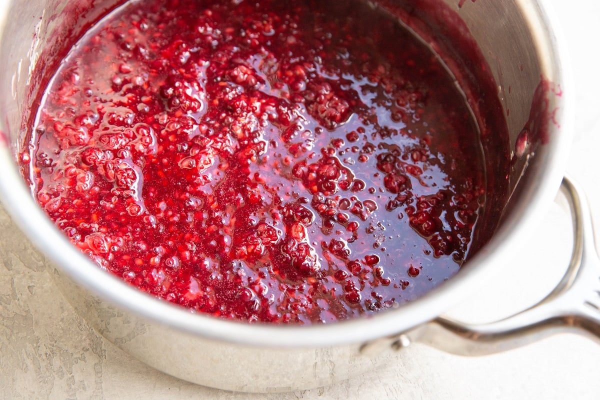 Saucepan with blackberry pie mixture.