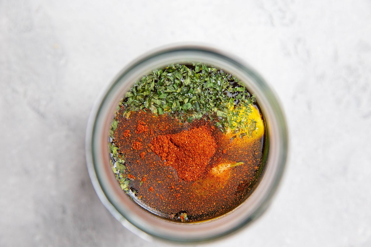 Ingredients for soy garlic marinade in a jar.