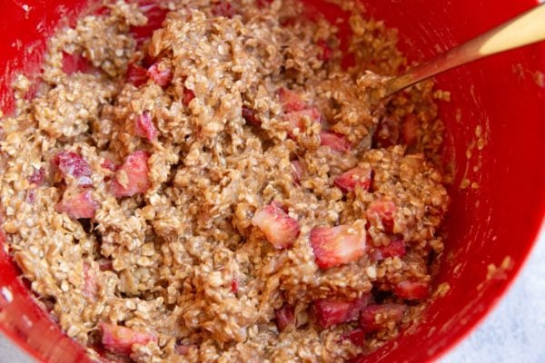 Strawberry oatmeal cookie dough in a mixing bowl.