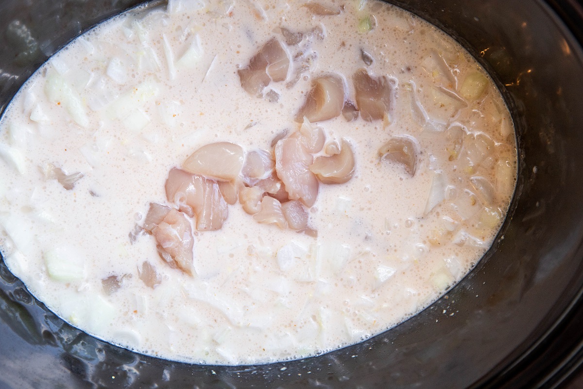 Ingredients for thai curry in a slow cooker.