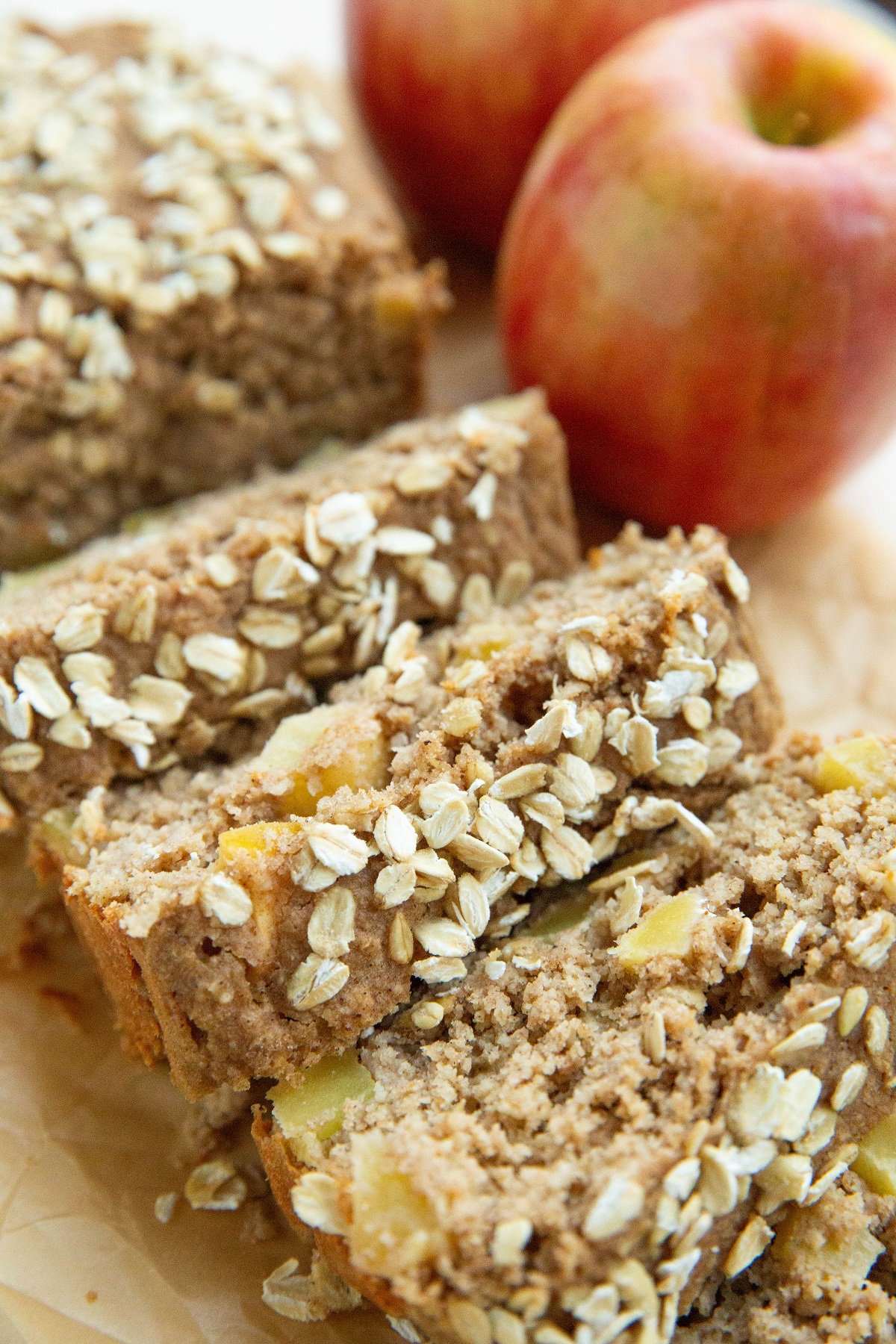 Loaf of apple bread cut into slices.