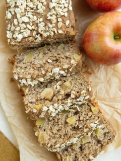 Loaf of healthy apple bread cut into slices.