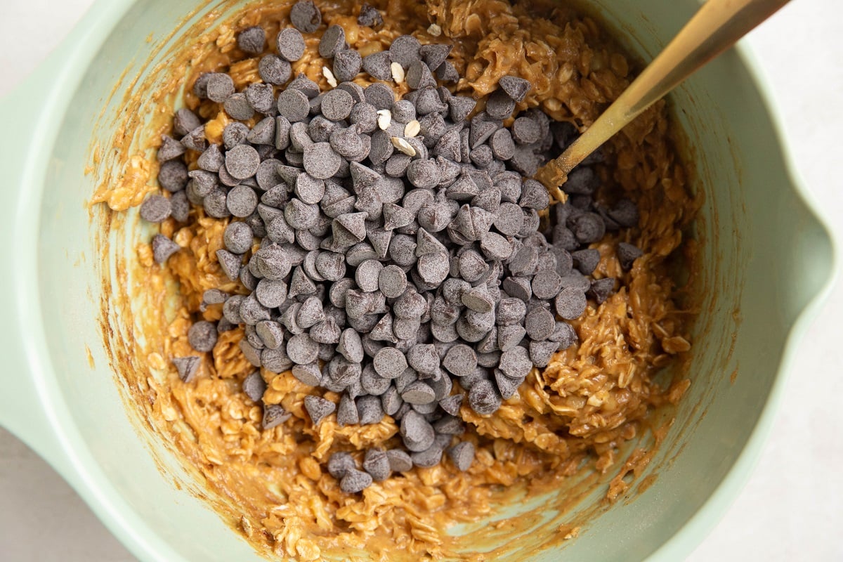 Chocolate chips on top of banana oatmeal mixture.