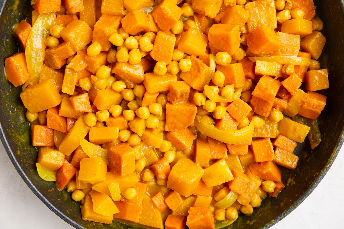 Finished butternut squash curry in a skillet.