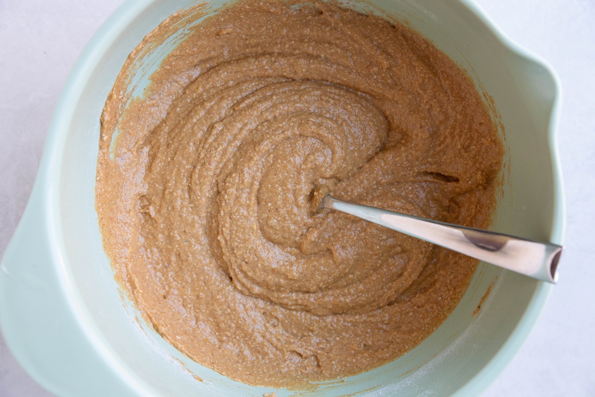 Pumpkin bread batter in a mixing bowl.