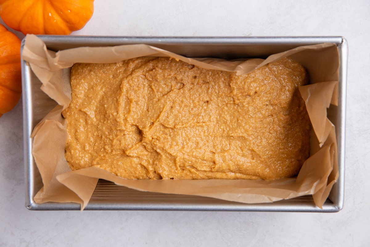 Pumpkin bread batter in a loaf pan.