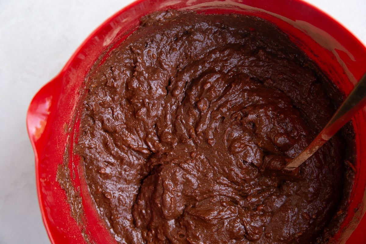 Chocolate cake batter in a mixing bowl.