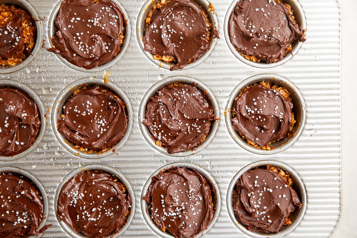 Pumpkin oatmeal cups with a chocolate ganache layer on top.