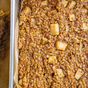 Baking pan of pumpkin apple bars, fresh out of the oven and ready to eat.