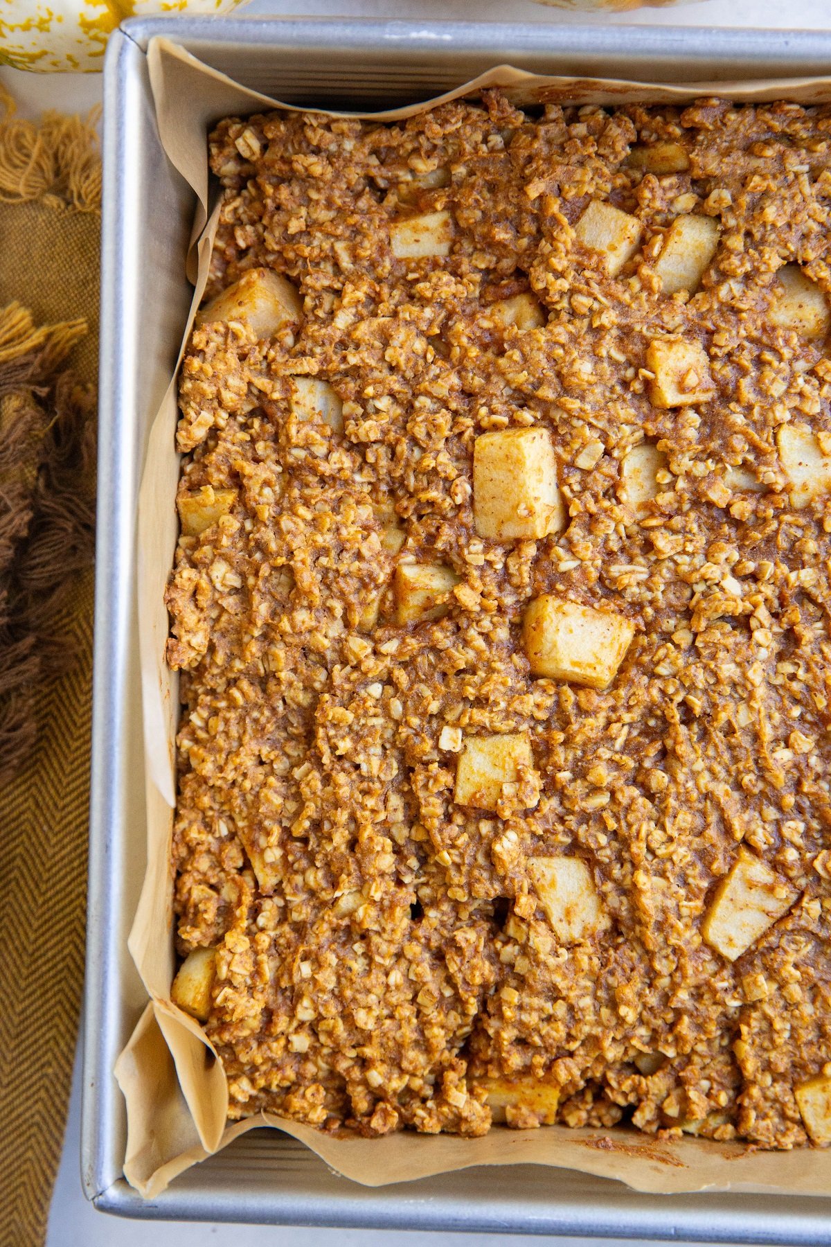 Baking pan of pumpkin apple bars, fresh out of the oven and ready to eat.