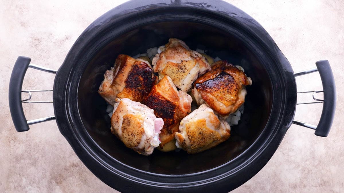 Crock pot with all of the ingredients inside.