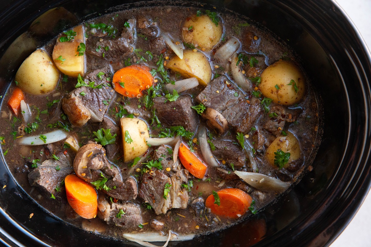 Beef stew in a crock pot, finished and ready to serve.