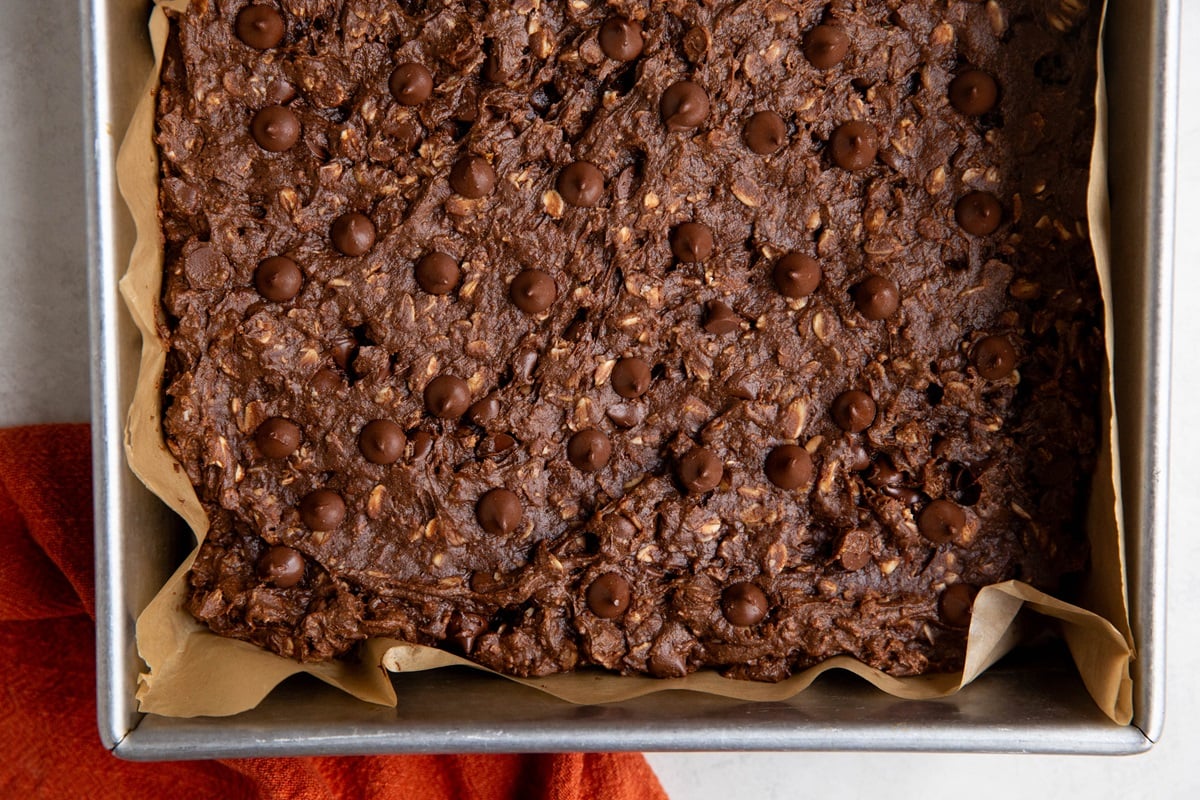 Double chocolate oatmeal peanut butter cookie bars in a baking dish.