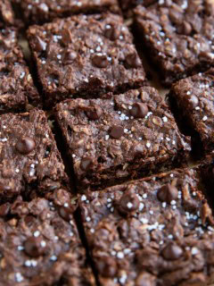 Chocolate peanut butter oatmeal cookie bars cut into individual squares