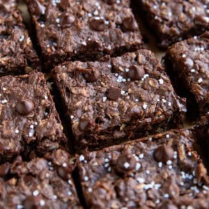 Chocolate peanut butter oatmeal cookie bars cut into individual squares