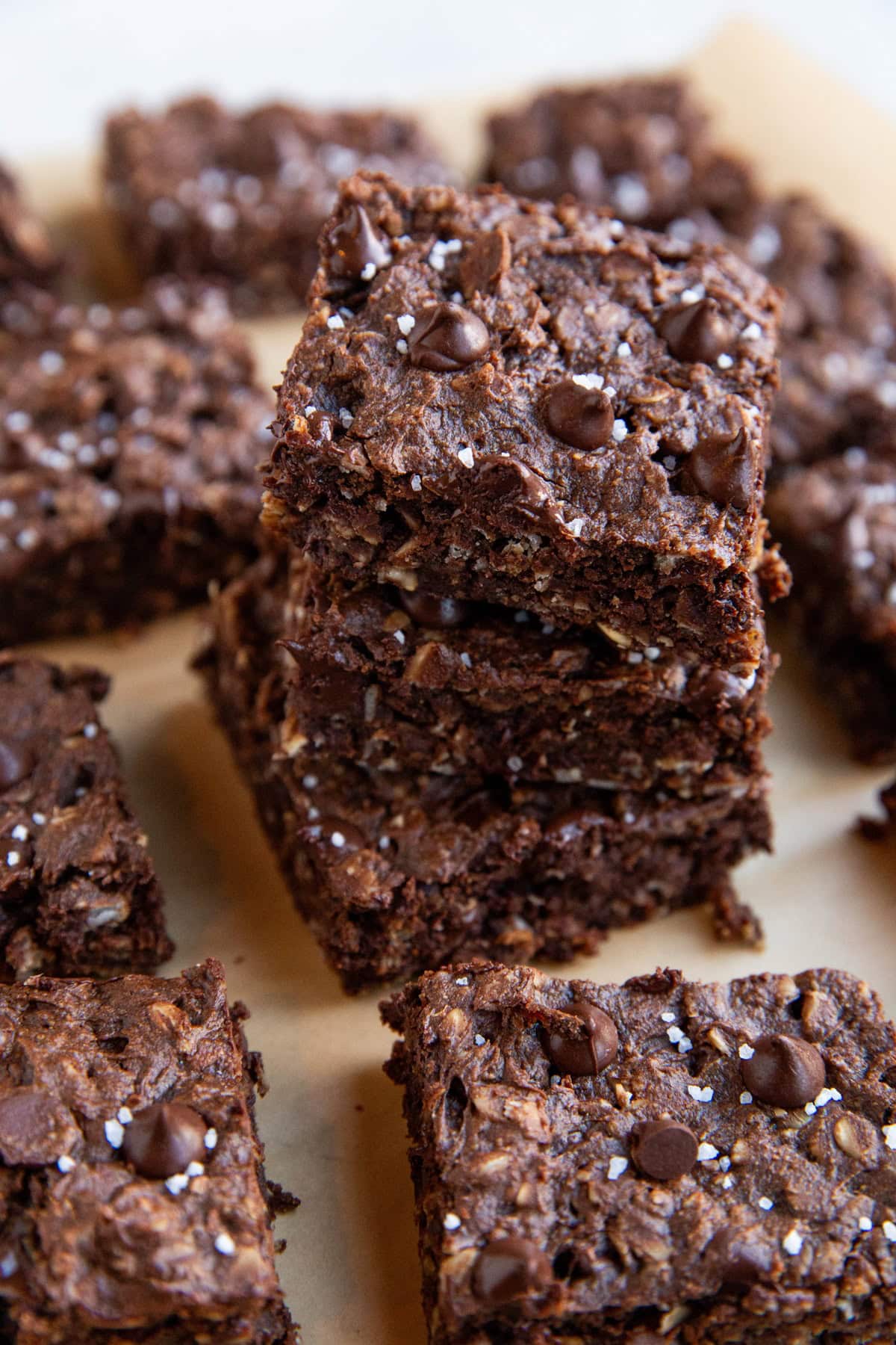 Stack of peanut butter chocolate cookie bars, ready to eat.