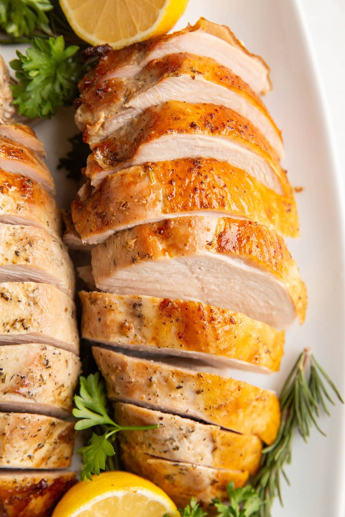 Sliced turkey breast on a platter.