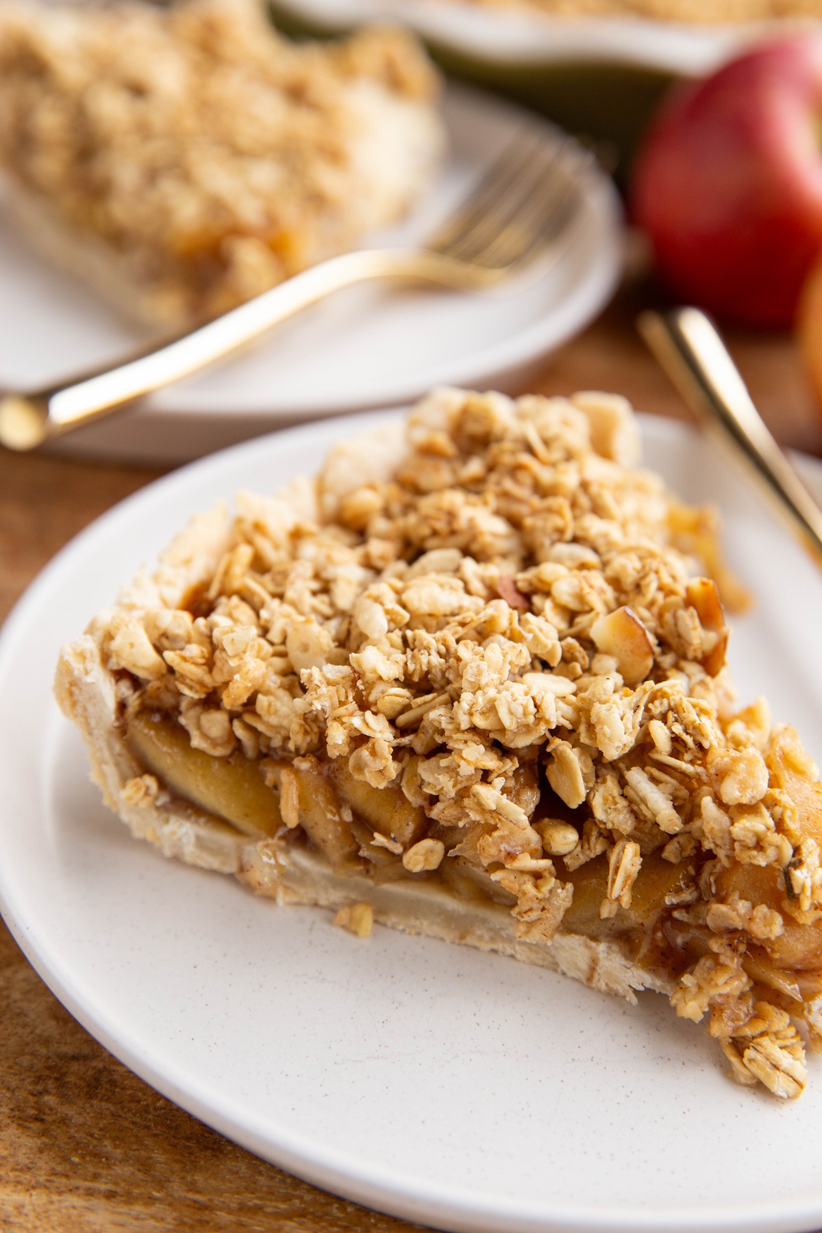 Close up on apple pie with crumble topping.