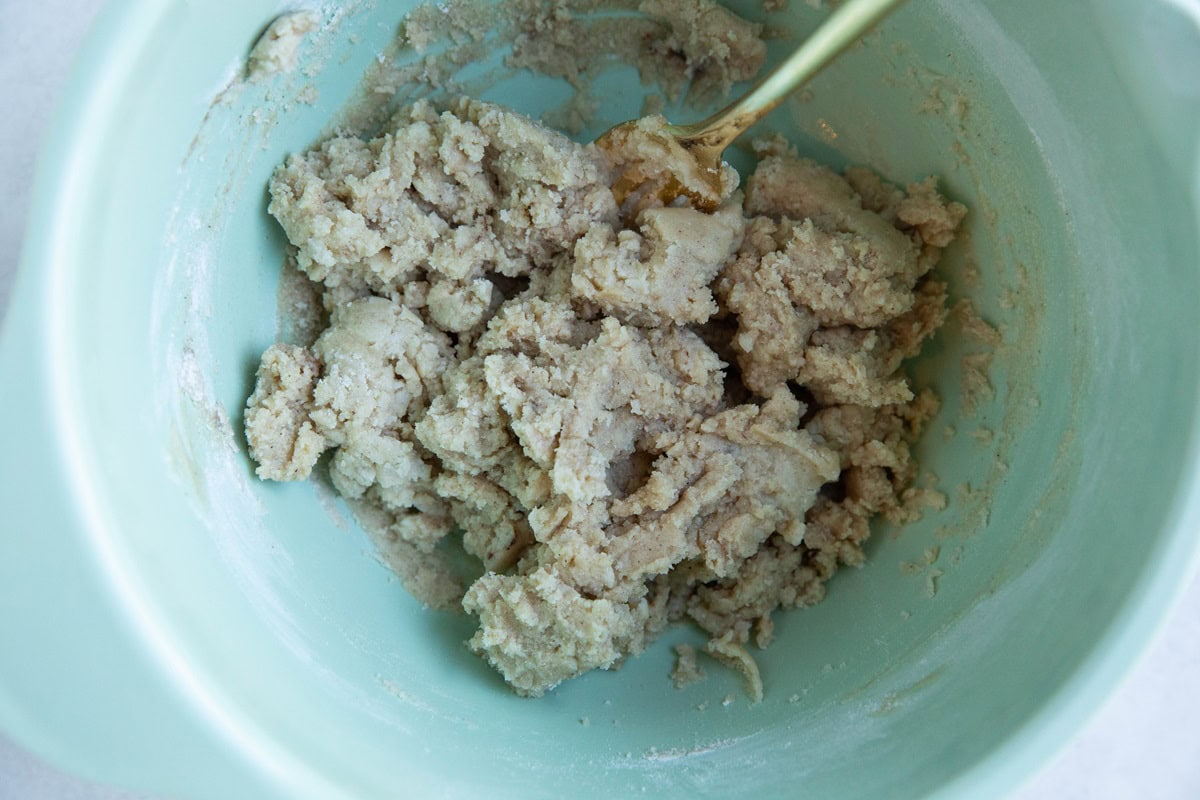 Crumble topping mixture in a mixing bowl, ready to use.