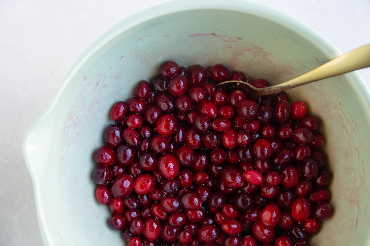 Cranberry crumble filling mixture in a mixing bowl.