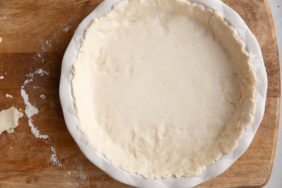 Pie dough in a pie pan.