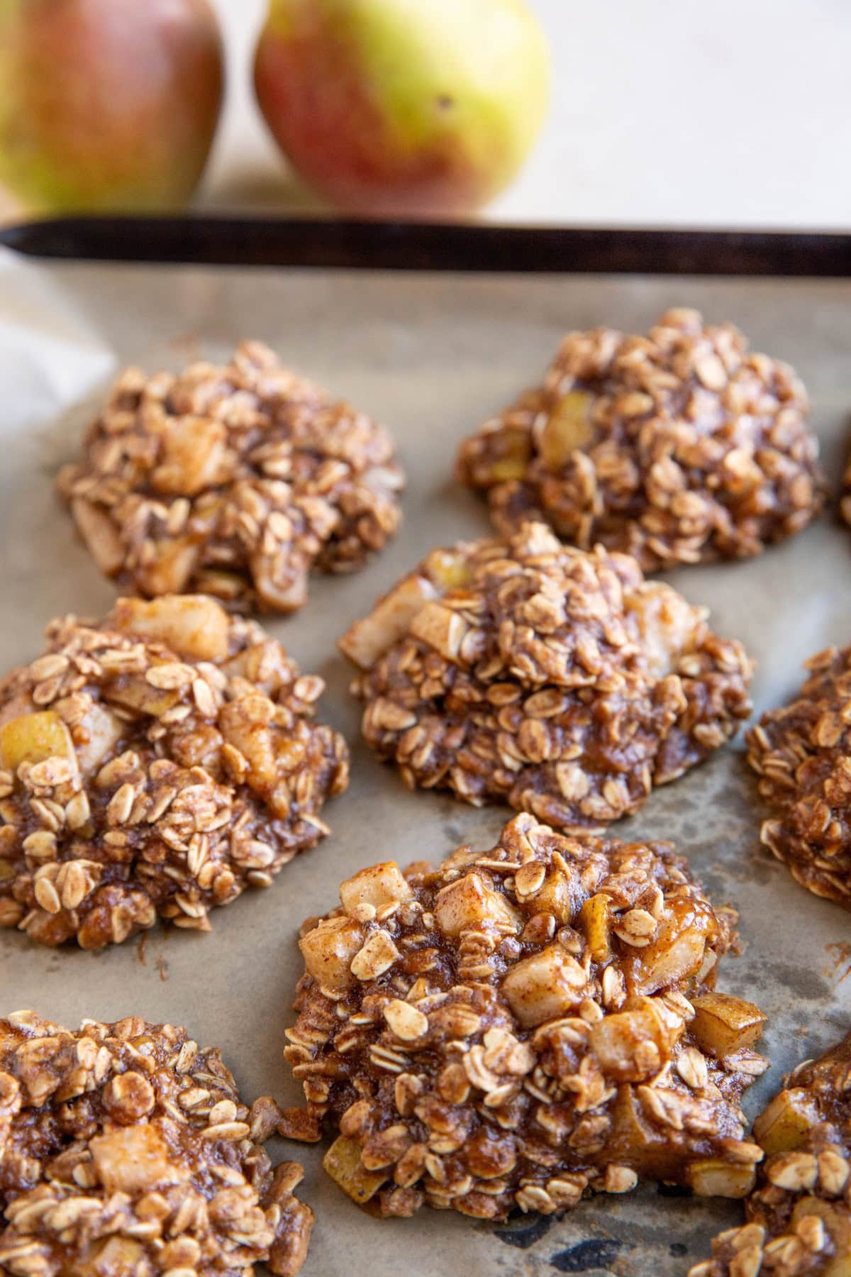 Cookie sheet with pear oatmeal cookies fresh out of the oven and ready to eat.