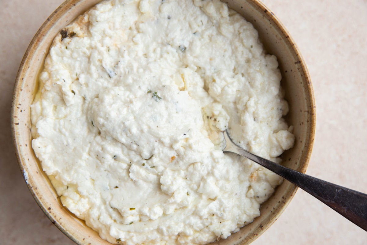 Creamy feta cheese in a serving dish.