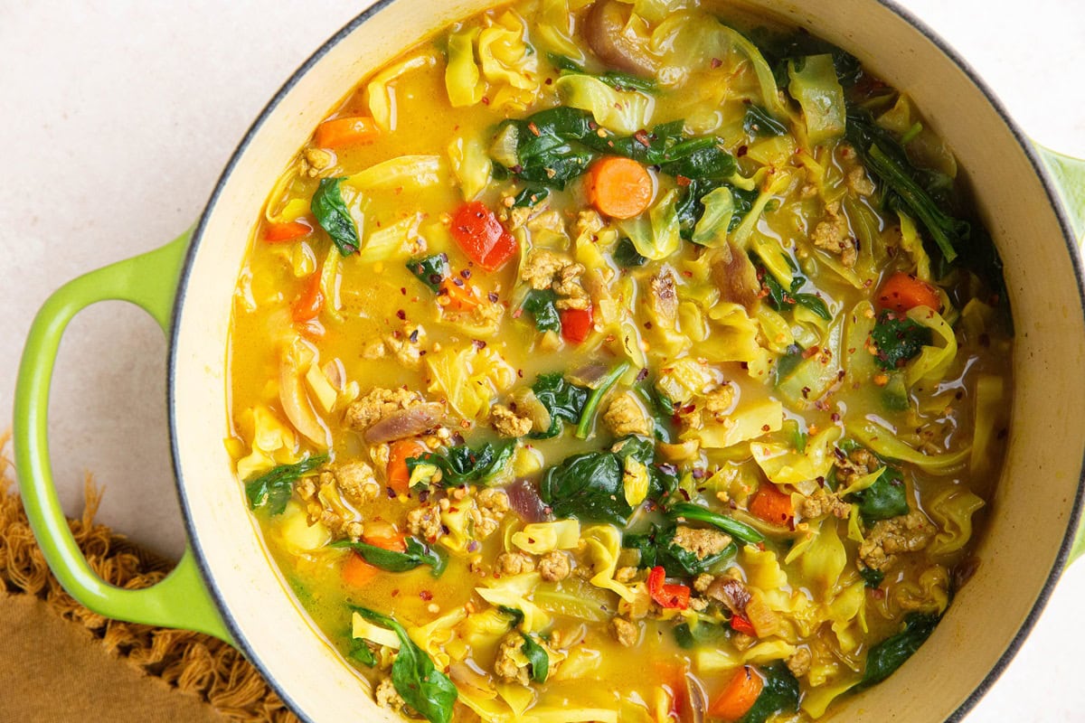 Pot of soup with ground beef and cabbage.