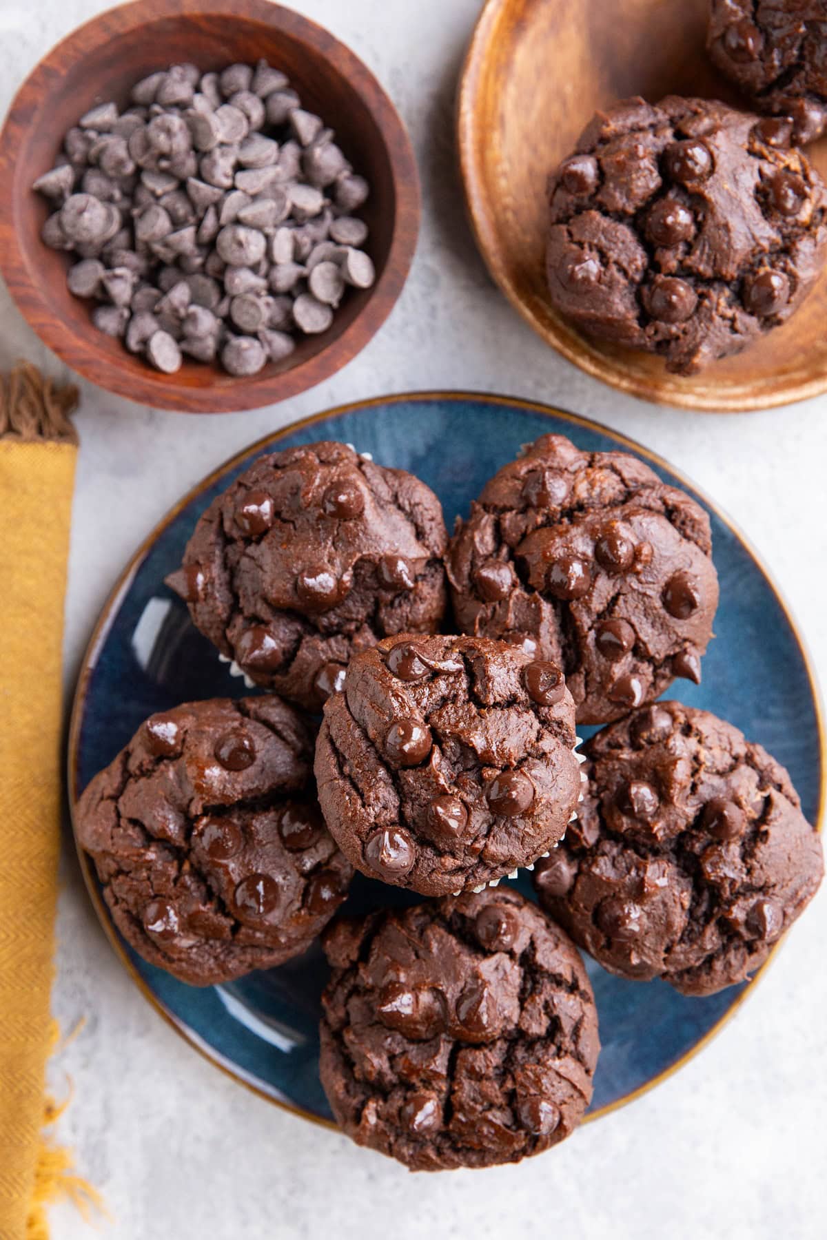 Blue plate of chocolate muffins.