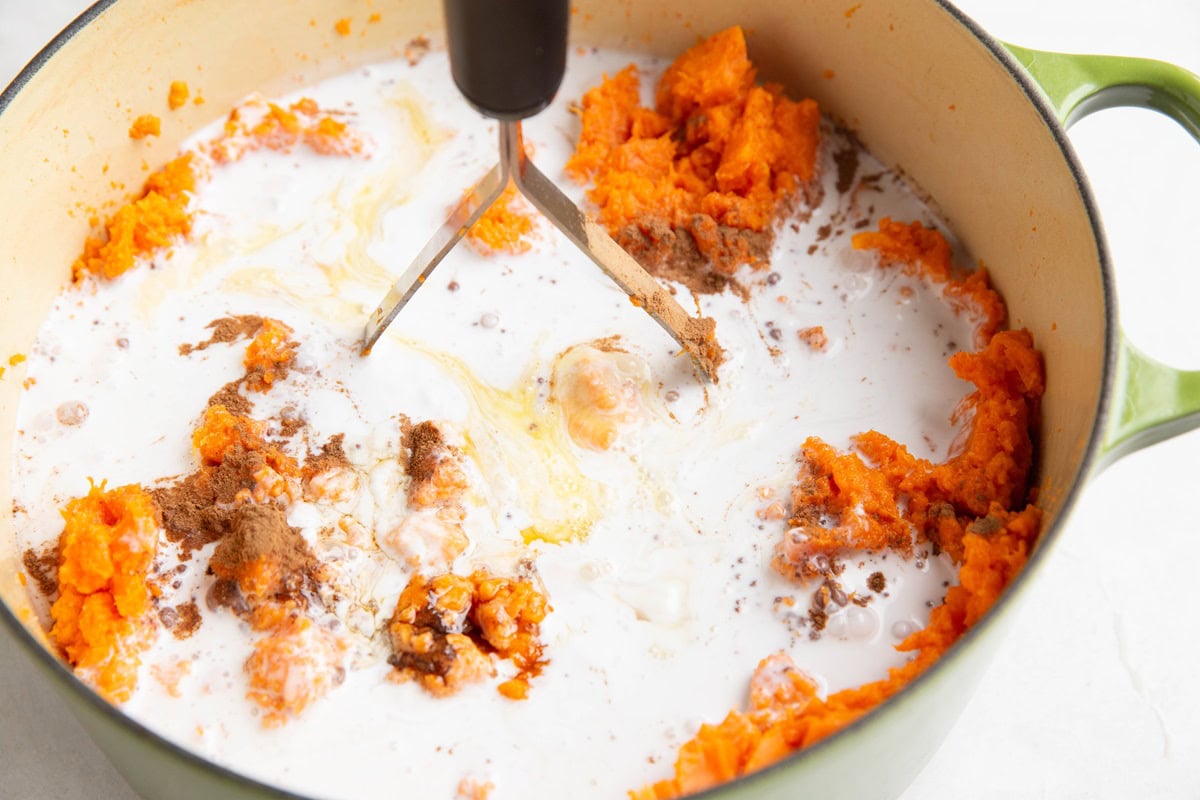 Pot of mashed potatoes, coconut milk, pure maple syrup, eggs, cinnamon, and salt.