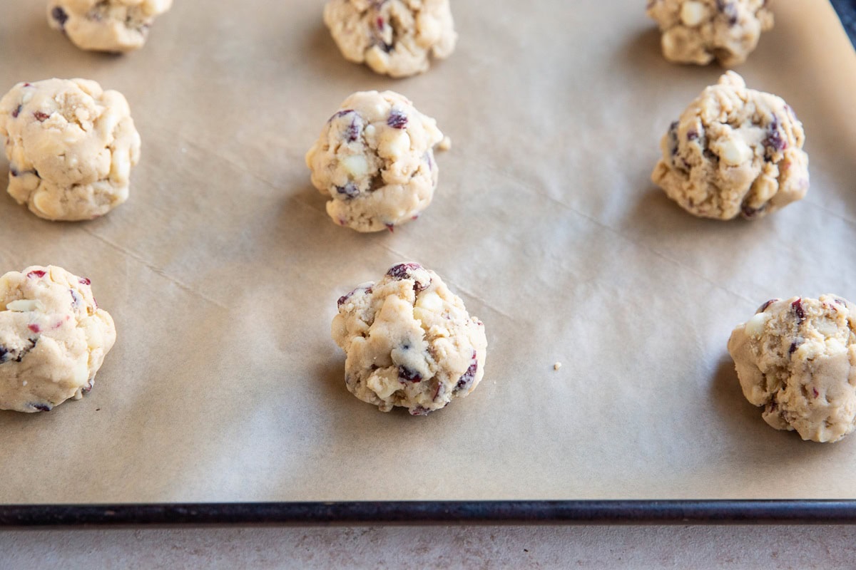 Balls of dough on a baking sheet.