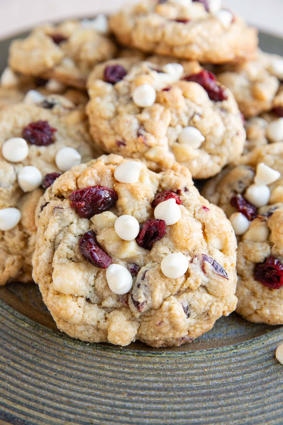 Plate of white chocolate chip cookies, ready to eat.