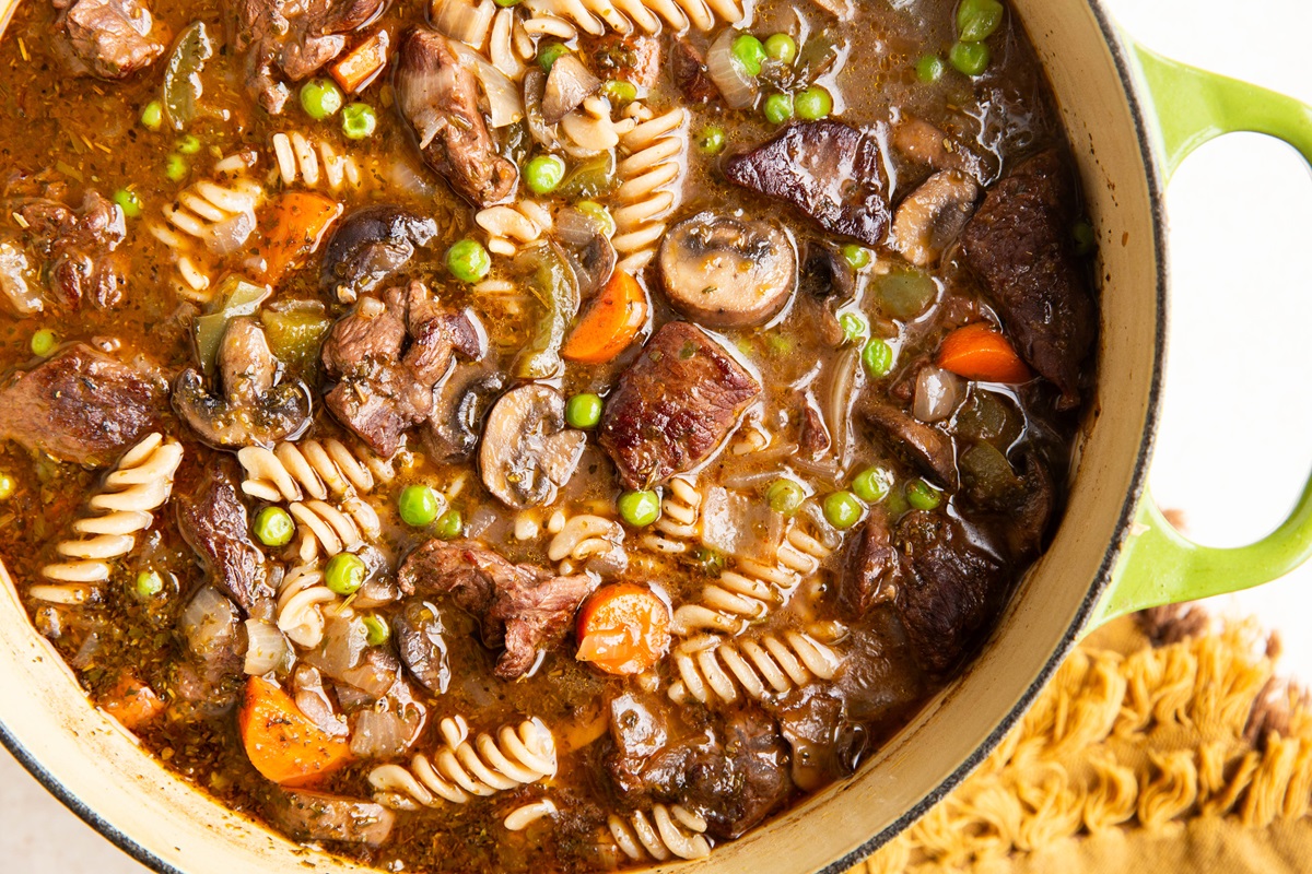 Large pot of beef noodle stew.