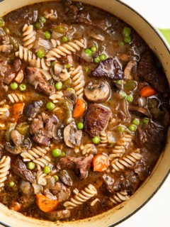 Large pot of beef and noodle stew.