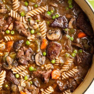 Large pot of beef and noodle stew.