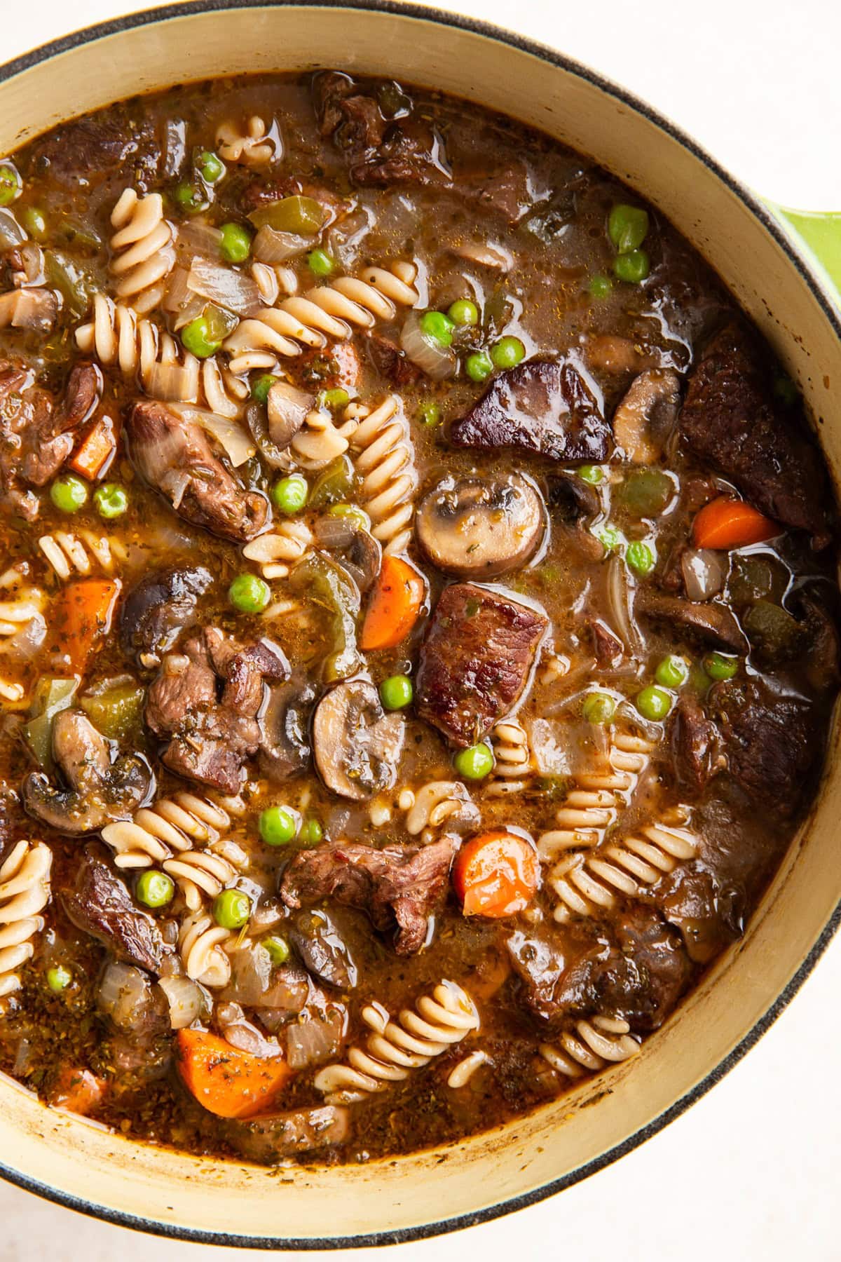 Large pot of beef and noodle stew.