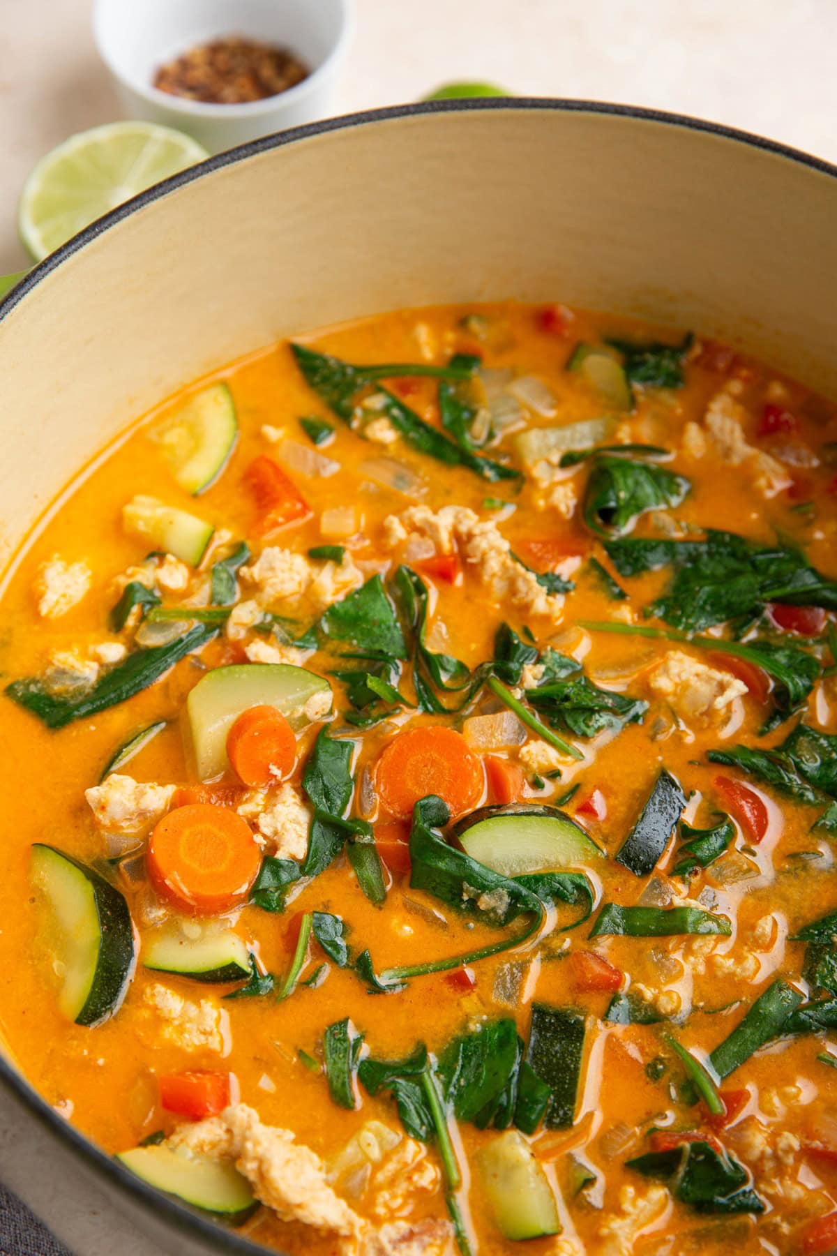 Big Dutch oven full of curry soup with ground turkey and vegetables.