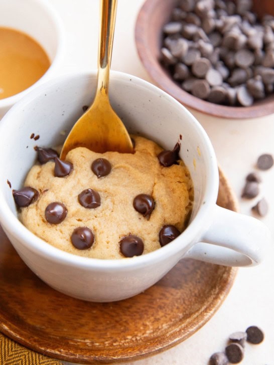 Mug with peanut butter cake inside for a single serve dessert.