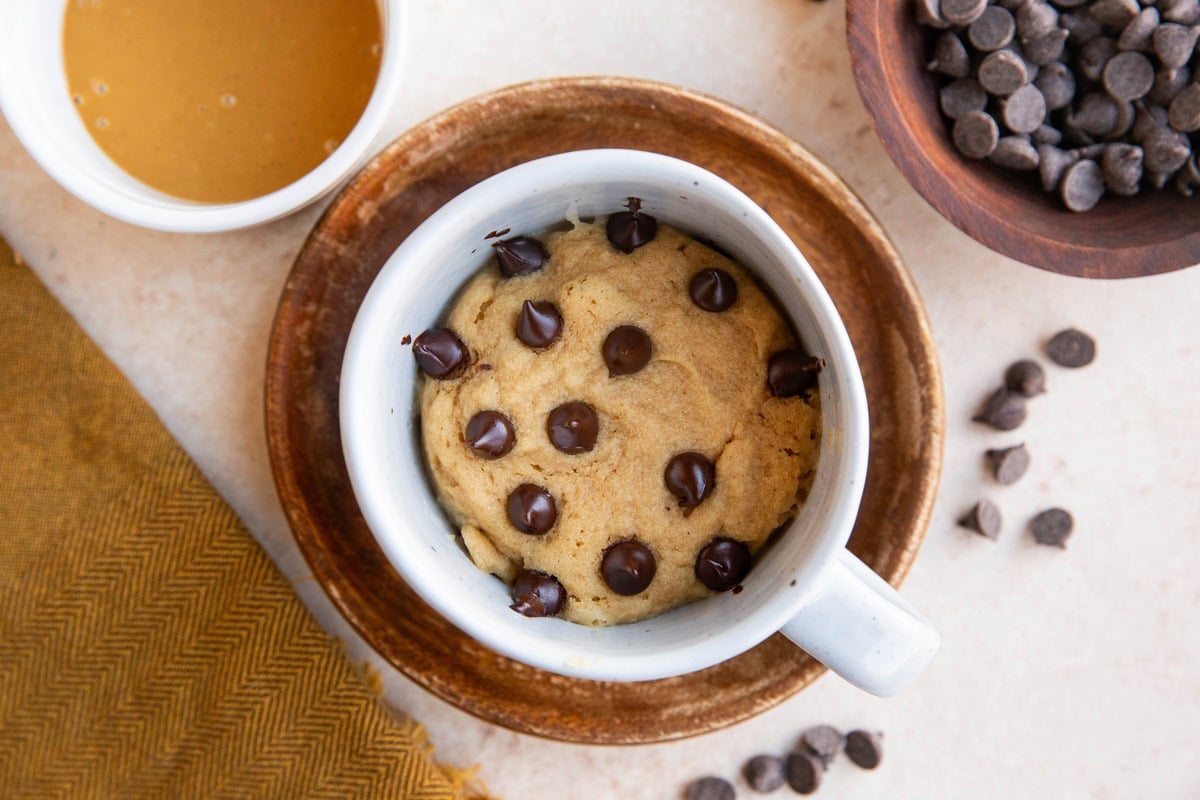 Mug with a single serving of peanut butter cake inside.