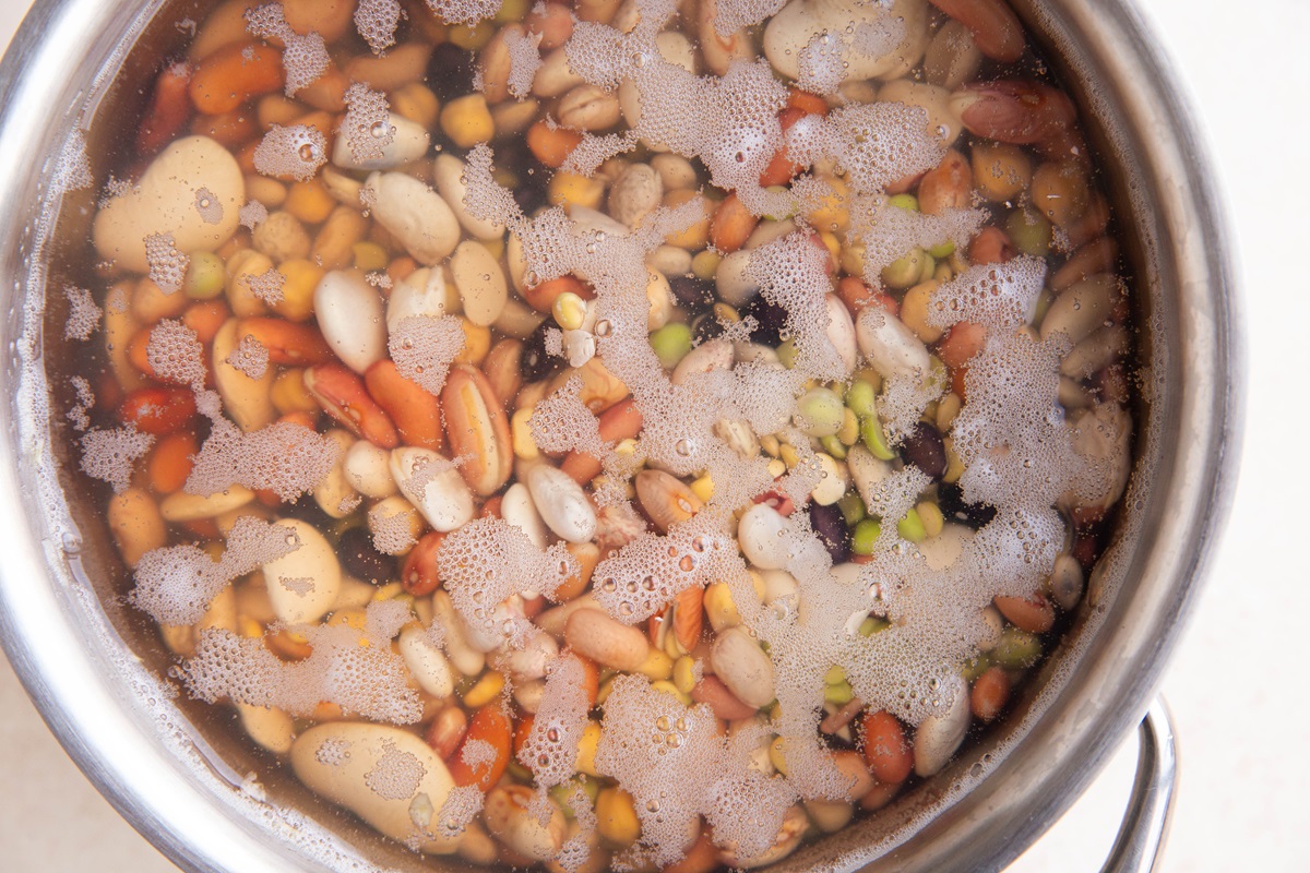 15 bean varieties soaking in a pot of water.