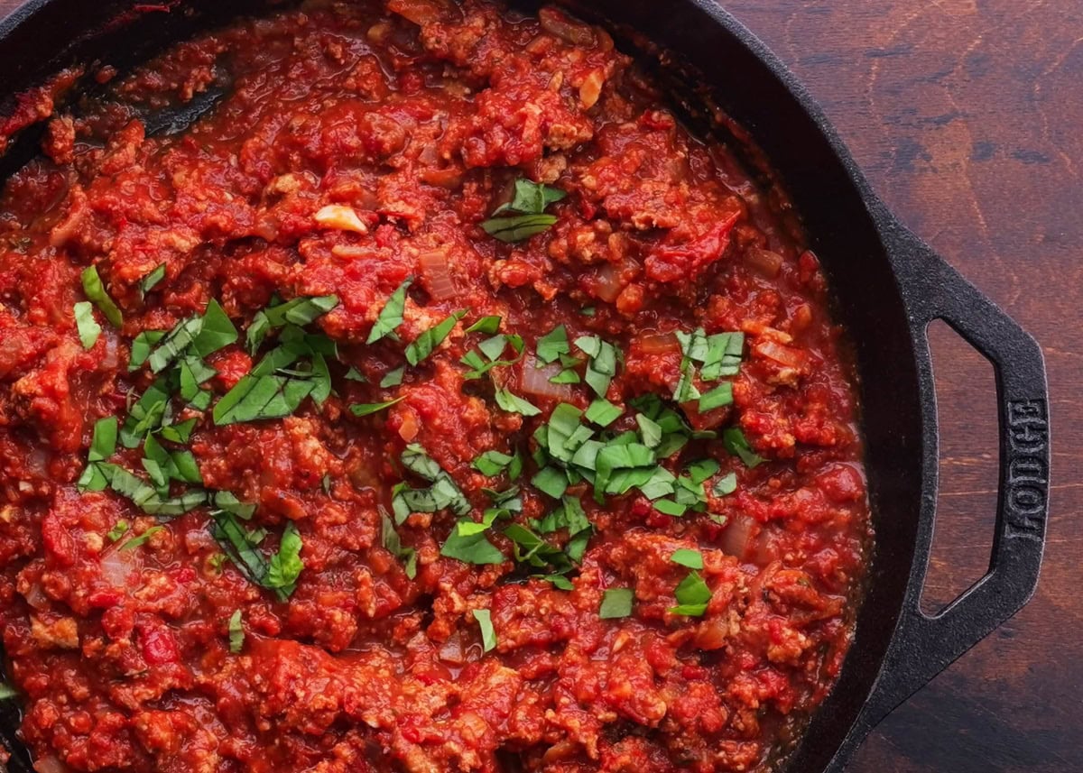 Turkey bolognese sauce in a skillet, ready to use.