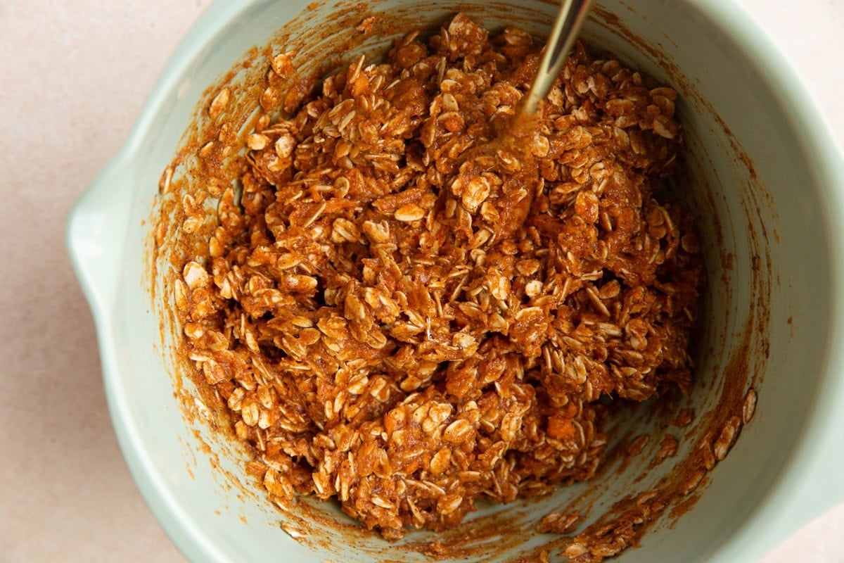 Mixing bowl with sweet potato cookie dough mixed up.