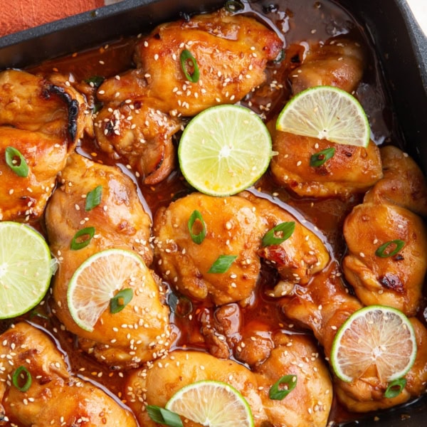 Roasting pan full of Korean BBQ chicken.