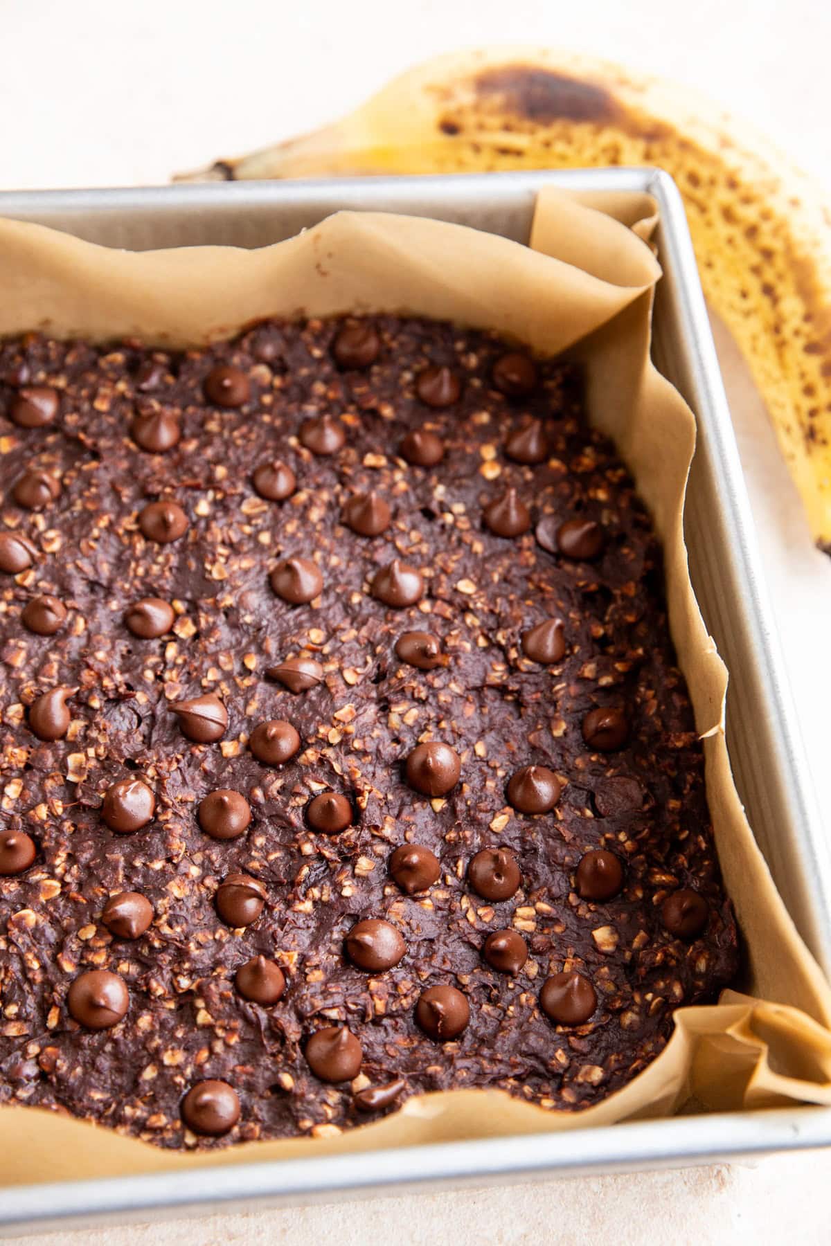 Baking dish of chocolate oatmeal bars fresh out of the oven.